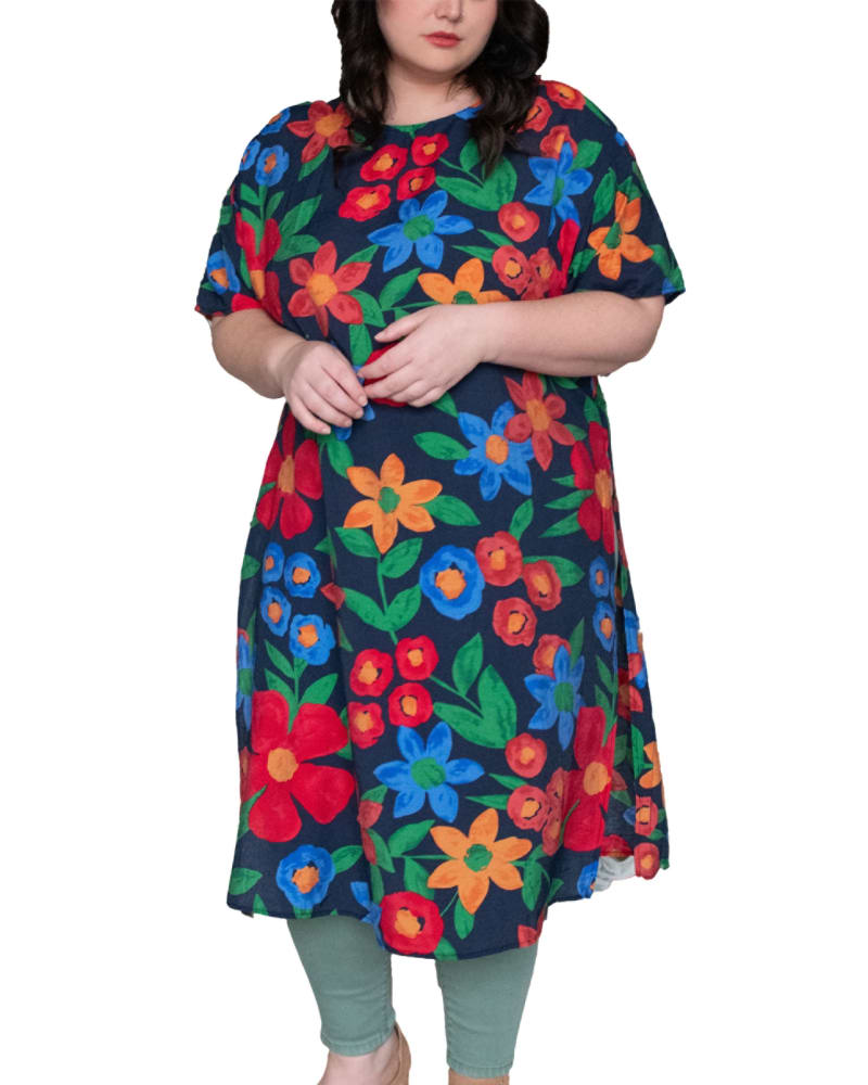 Front of a model wearing a size XL Gaelle Tunic Top Side Slit Floral Print Navy in Navy by ANNICK. | dia_product_style_image_id:282068